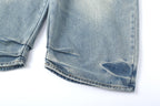 CLP Whiskering Washed Oversized Curved-Leg Jeans