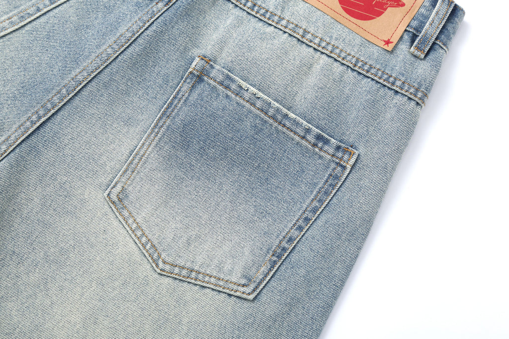 CLP Whiskering Washed Oversized Curved-Leg Jeans