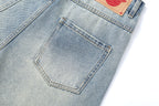 CLP Whiskering Washed Oversized Curved-Leg Jeans