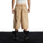 DND4DES Geometric Panel Studded Wide-Leg Shorts