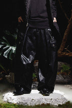 RELABEL Multi-Pocket Pleated Faux Leather Wide-Leg Pants