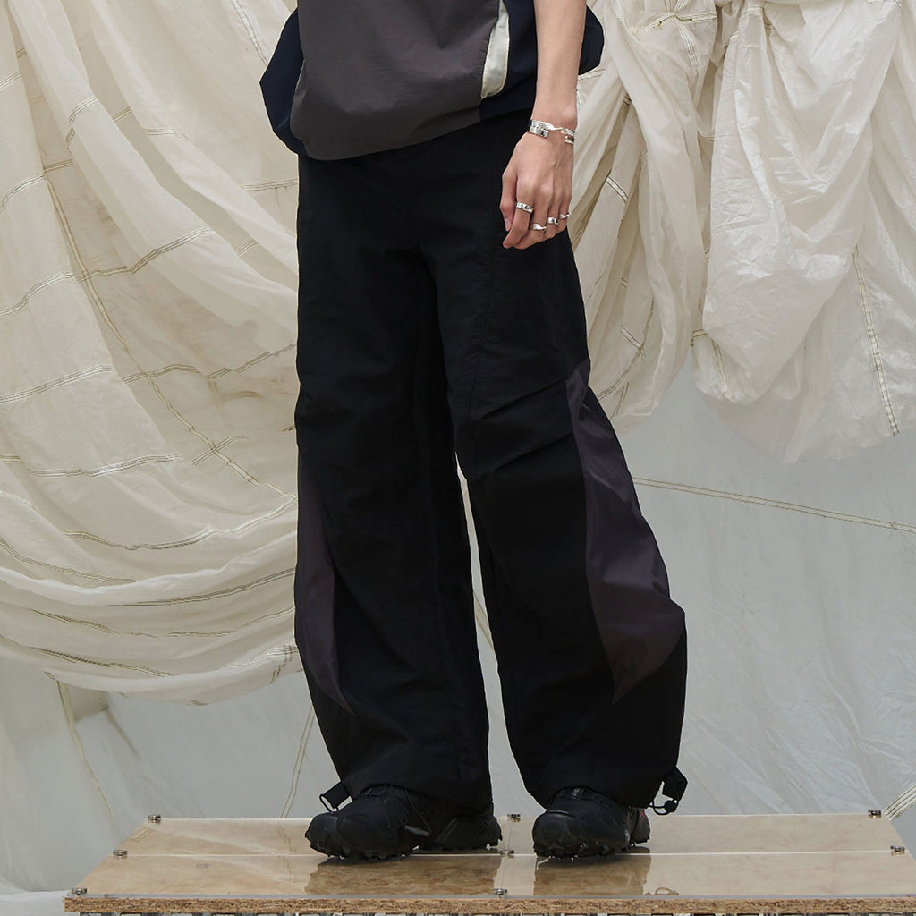 RELABEL Deconstructed Paneled Drawstring Parachute Pants