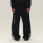 SAVAGEGROWTHWORLD Back-Arc Striped Graphic Track Pants