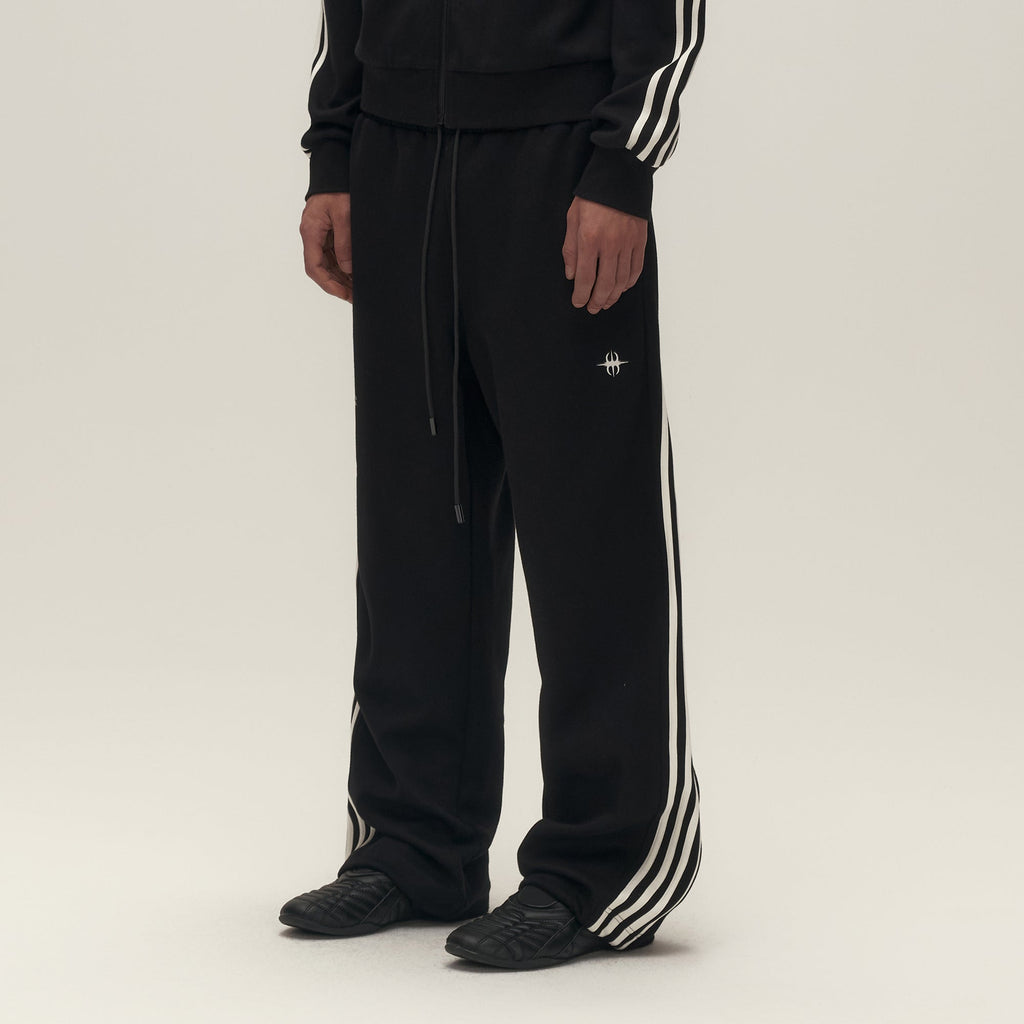 SAVAGEGROWTHWORLD Back-Arc Striped Graphic Track Pants