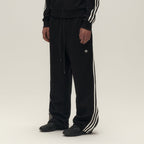 SAVAGEGROWTHWORLD Back-Arc Striped Graphic Track Pants