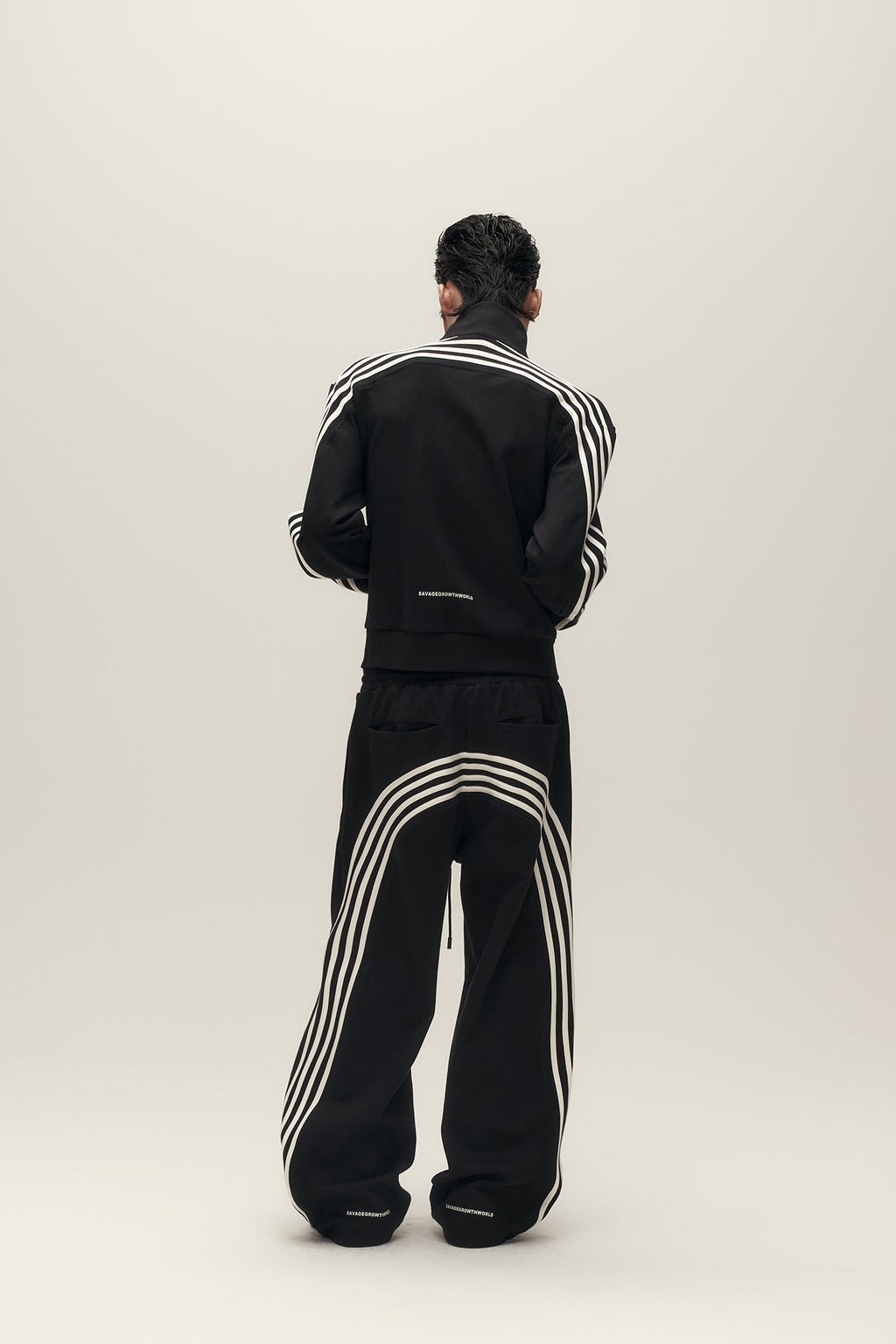 SAVAGEGROWTHWORLD Back-Arc Striped Graphic Track Pants
