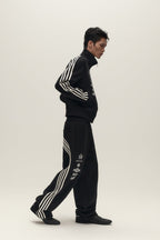 SAVAGEGROWTHWORLD Back-Arc Striped Graphic Track Pants