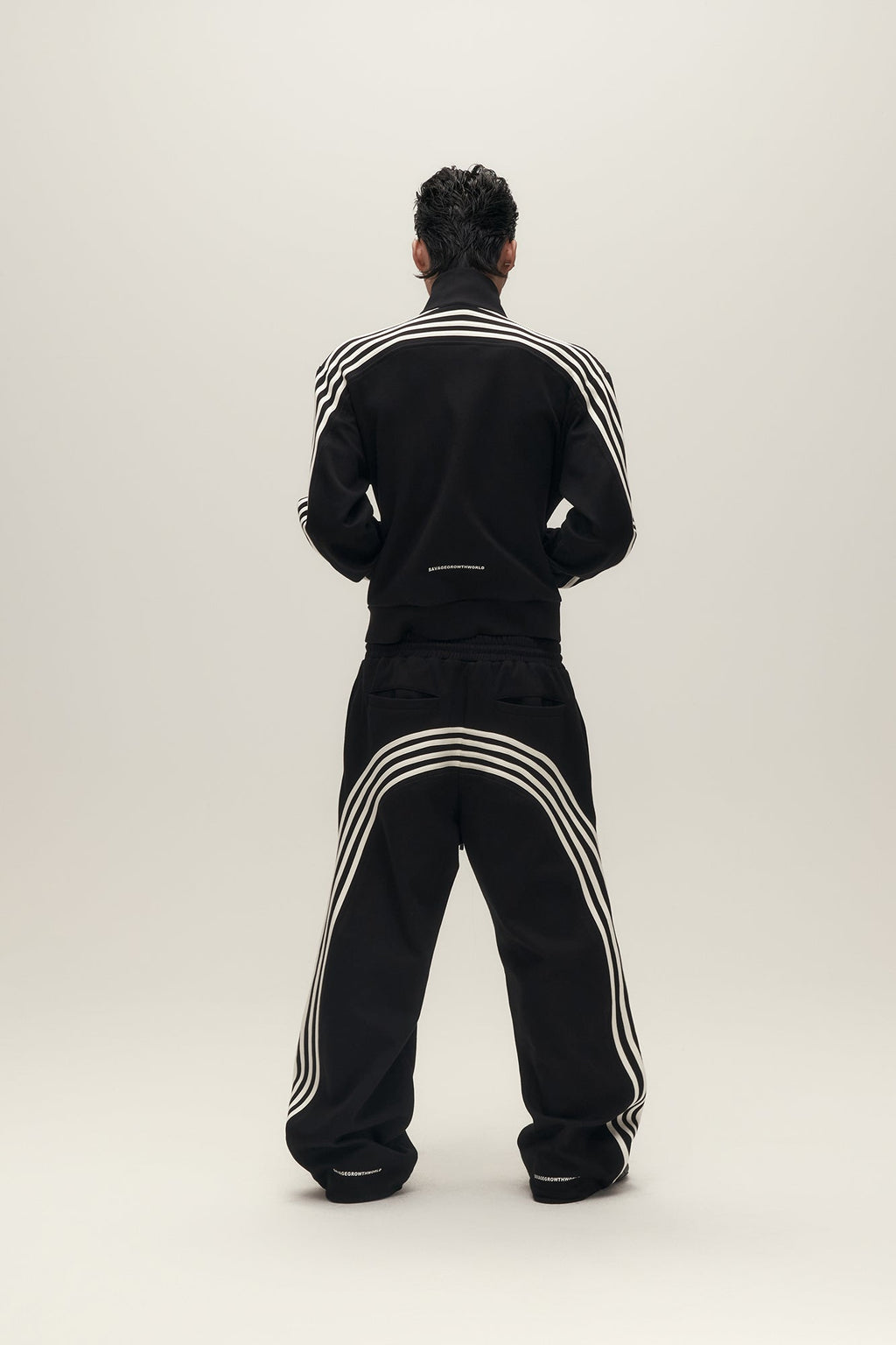 SAVAGEGROWTHWORLD Back-Arc Striped Graphic Track Pants