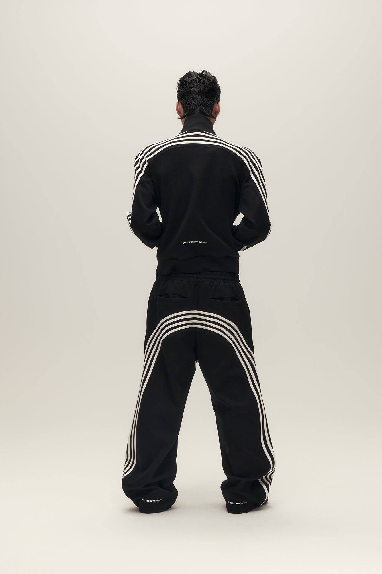 SAVAGEGROWTHWORLD Back-Arc Striped Graphic Track Pants