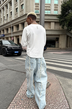 STEEPC Washed Frayed Seam Baggy Jeans