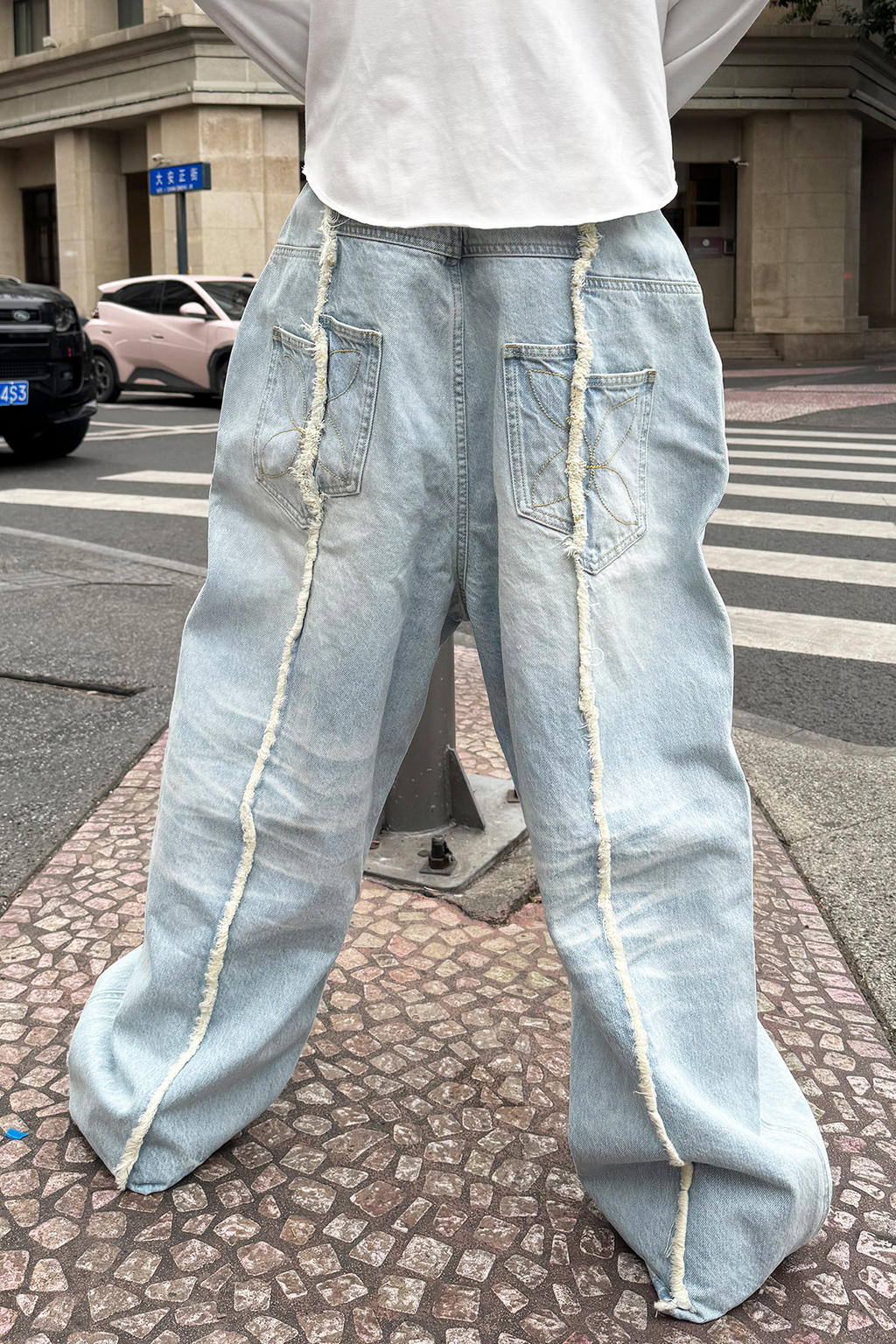 STEEPC Washed Frayed Seam Baggy Jeans