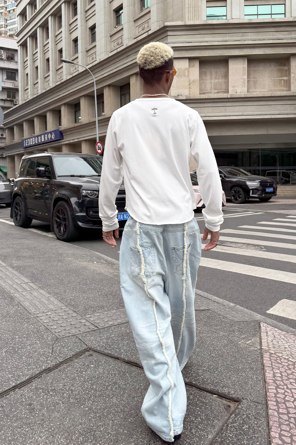 STEEPC Washed Frayed Seam Baggy Jeans