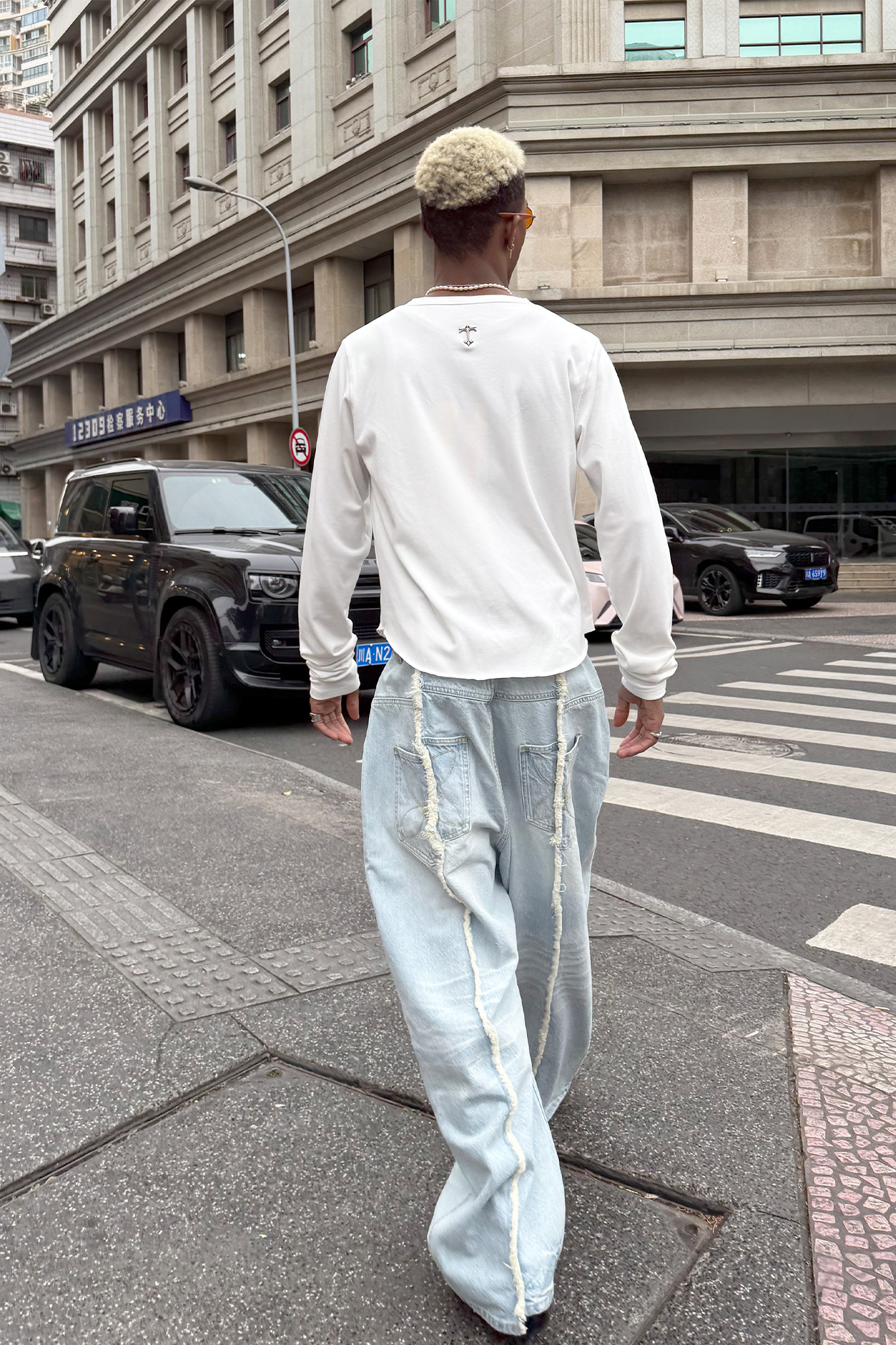 STEEPC Washed Frayed Seam Baggy Jeans