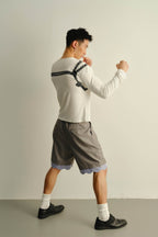 KADAKADA Scalloped Layered Hem Pleated Shorts