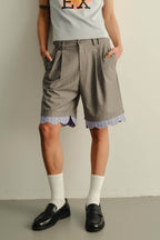 KADAKADA Scalloped Layered Hem Pleated Shorts