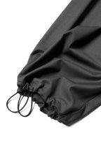 RELABEL Pleated Drawstring Curved Wide-Leg Trousers