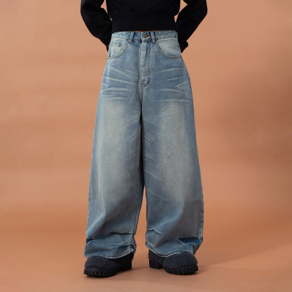 CLP Whiskering Washed Oversized Curved-Leg Jeans