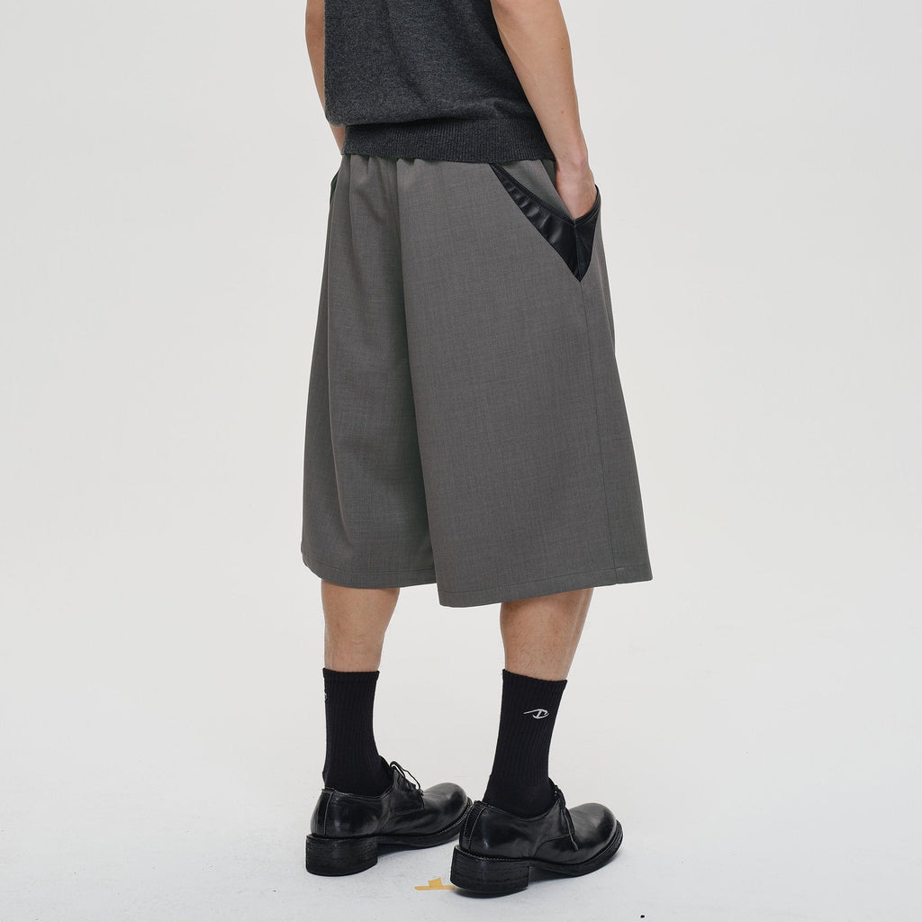 CATSSTAC Pleated Belted Wide-Leg Shorts