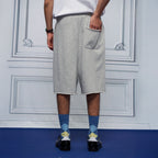 UNLIMITED MOTE Multi-Pleated Drawstring Raw-Hem Shorts