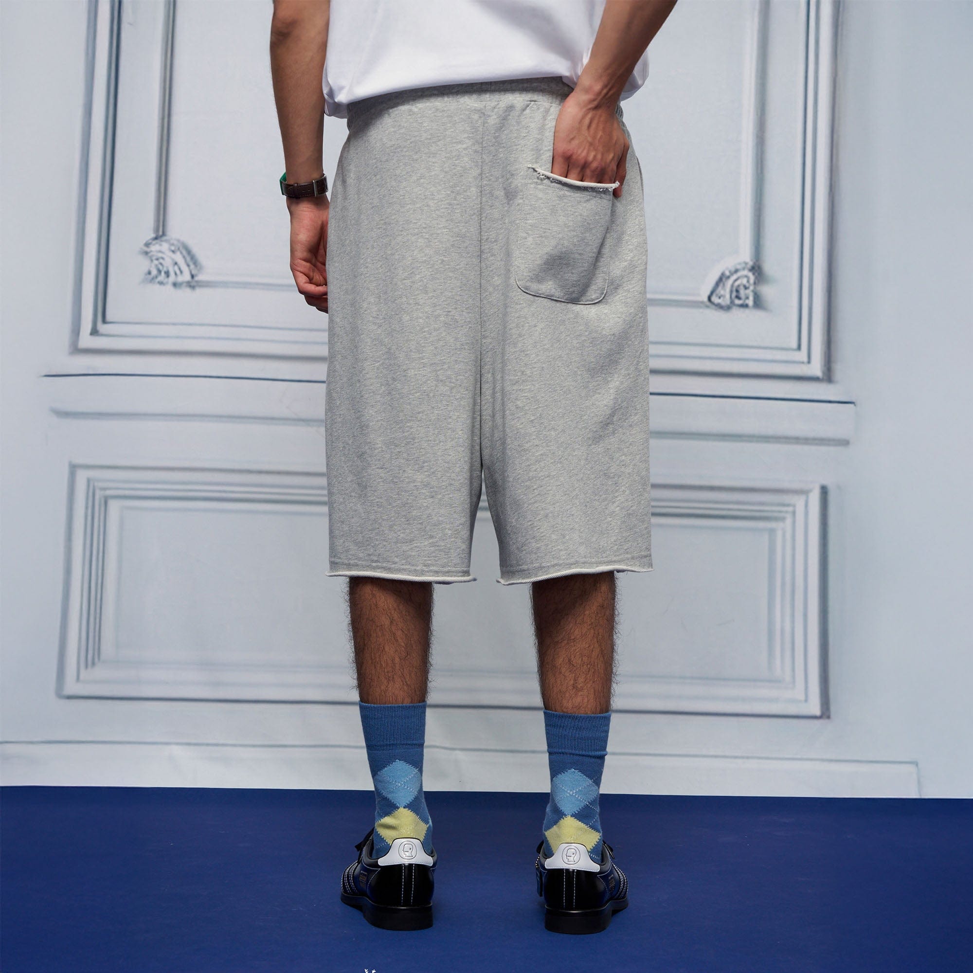 UNLIMITED MOTE Multi-Pleated Drawstring Raw-Hem Shorts
