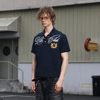 SAVAGEGROWTHWORLD Retro Crest Graphic Polo Tee