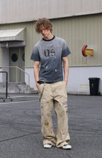 SAVAGEGROWTHWORLD Studded Distressed Graphic T-Shirt