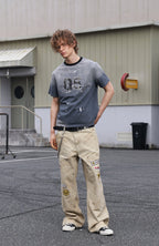 SAVAGEGROWTHWORLD Studded Distressed Graphic T-Shirt