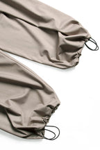 RELABEL Pleated Drawstring Curved Wide-Leg Trousers