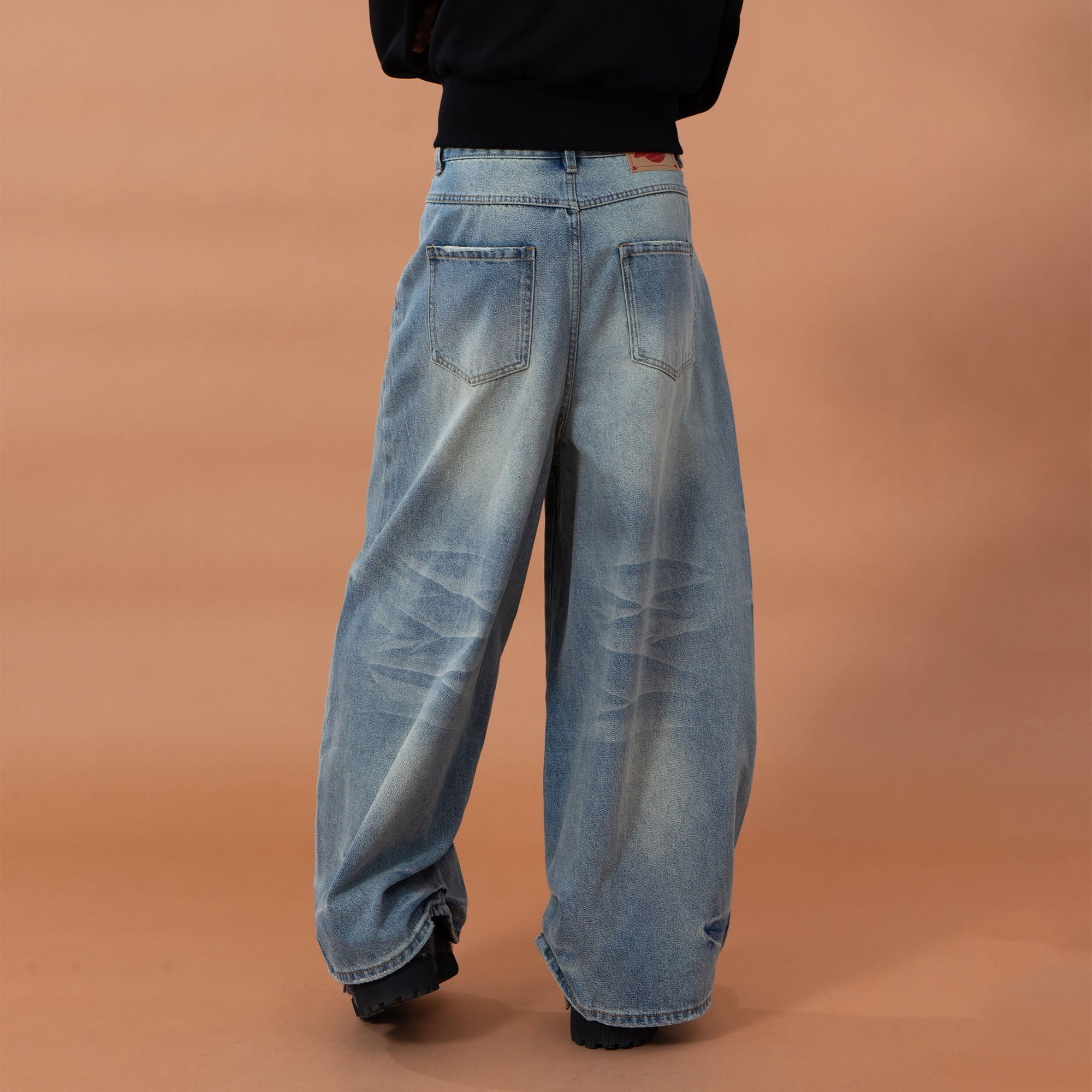 CLP Whiskering Washed Oversized Curved-Leg Jeans