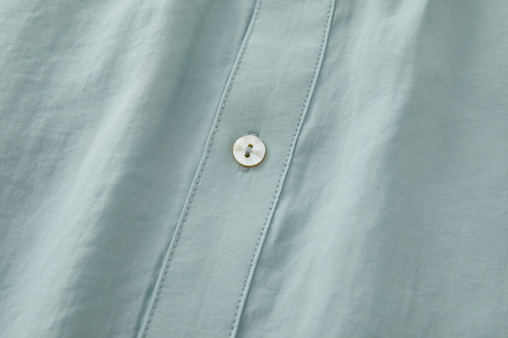 OPICLOTH Retro Pintuck Ruffle Modal Blend Half Shirt