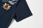 SAVAGEGROWTHWORLD Retro Crest Graphic Polo Tee