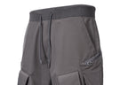 CATSSTAC Multi-Pocket Paneled Drawstring Cargo Pants
