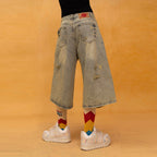 CLP Washed Ripped Knee-Length Denim Shorts