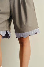 KADAKADA Scalloped Layered Hem Pleated Shorts