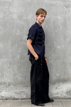 ESAIAS Asymmetrical Rivet-Strap Half Shirt