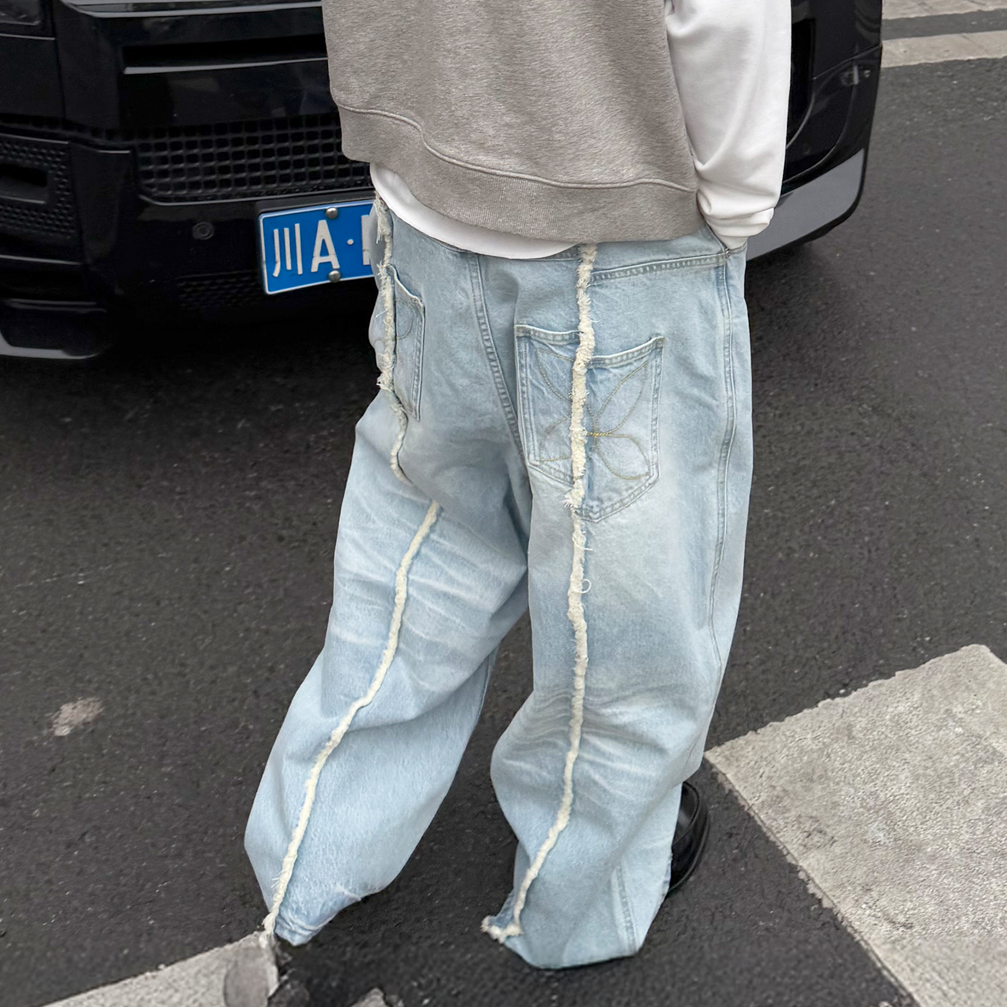 STEEPC Washed Frayed Seam Baggy Jeans